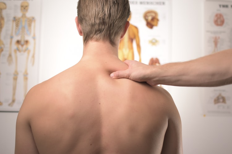 CBD For Back Pain the back of a mans back